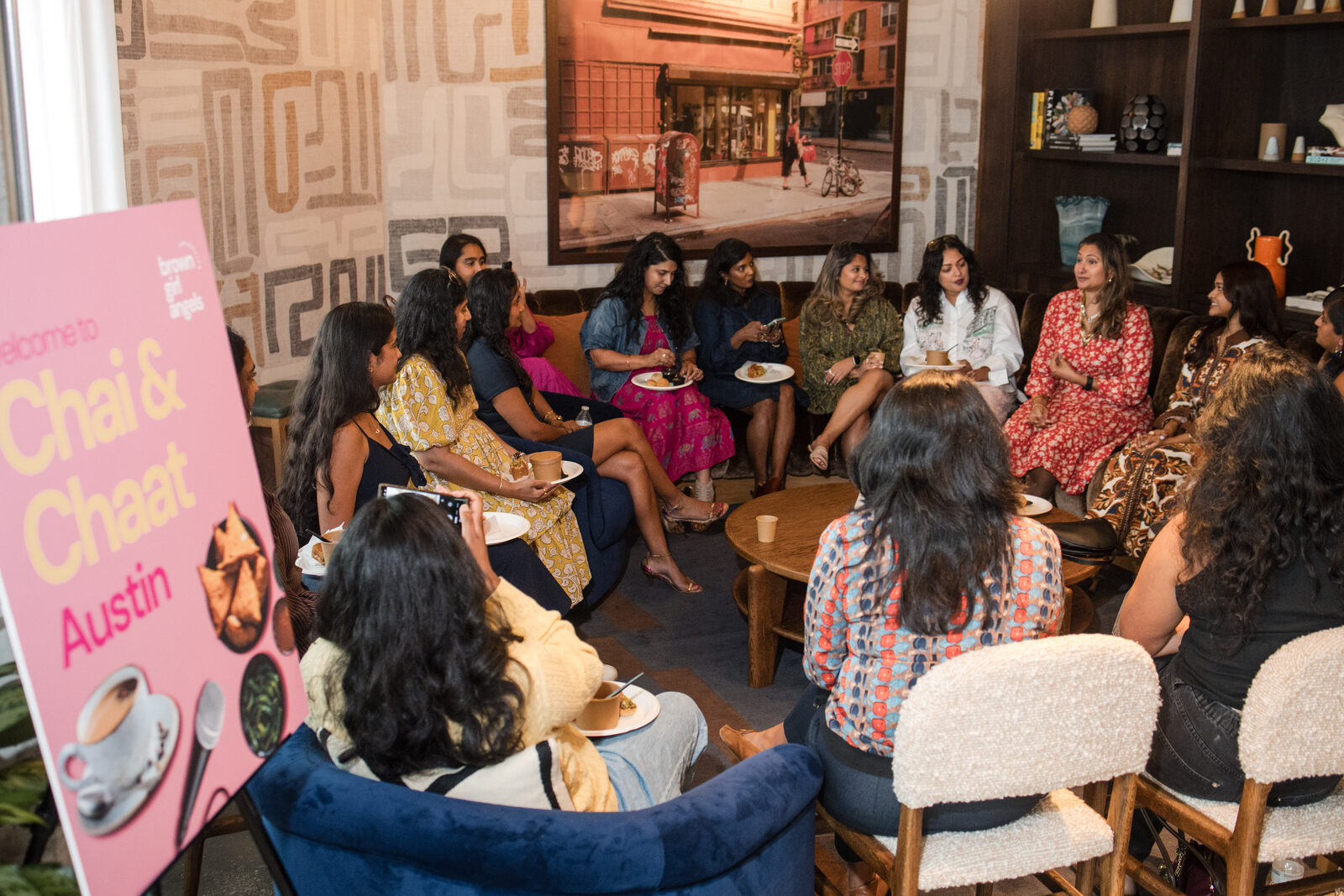 South Asian women gathered in conversation circle at Chai & Chaat Austin