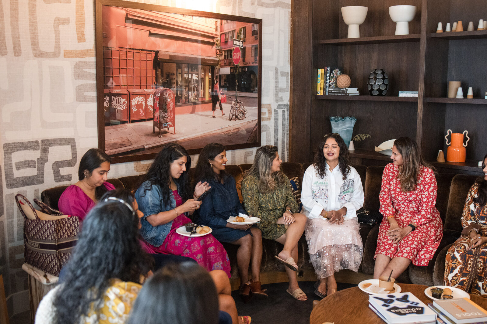 A speaker holding court mid-conversation at Chai & Chaat Austin